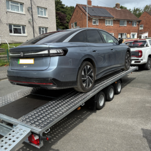 UMOVE car transporter loaded with a car